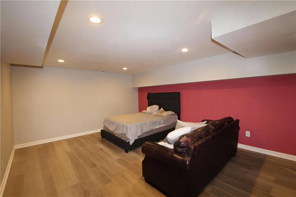 500 Piedmont Road Marietta, GA 30066 - Photo 24 of 40 a bedroom with two beds and a couch