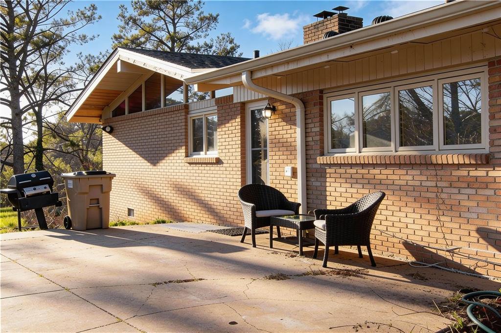 500 Piedmont Road Marietta, GA 30066 - Photo 28 of 40 a view of a house with backyard and sitting area