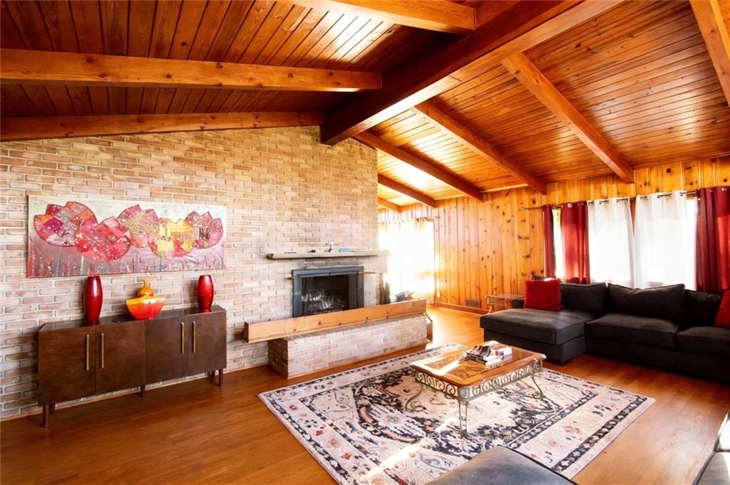 500 Piedmont Road Marietta, GA 30066 - Photo 5 of 40 a living room with furniture and a fireplace