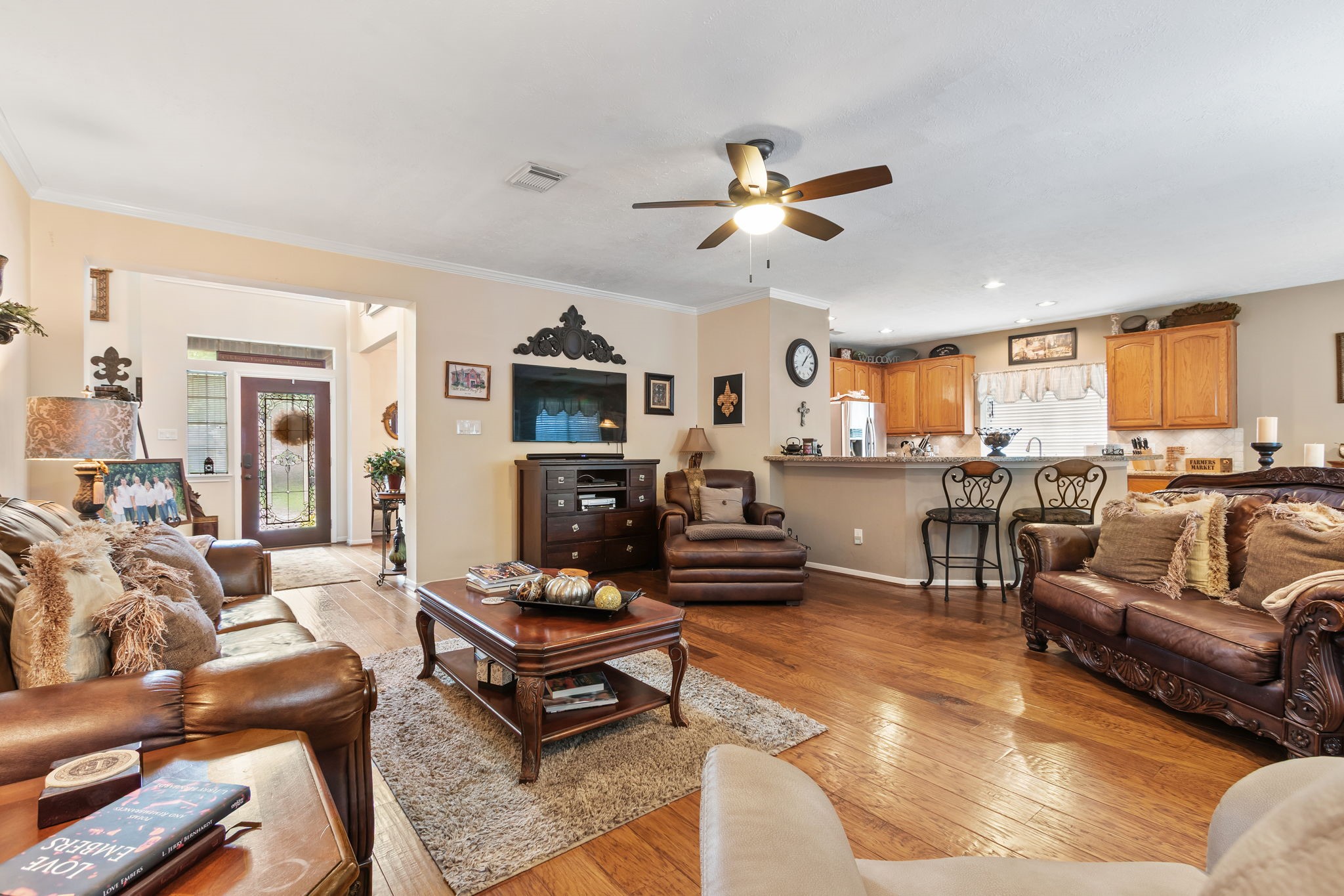 3618 Walnut Forest Lane Spring, TX 77388 - Photo 13 of 41 a living room with furniture a fireplace and a flat screen tv