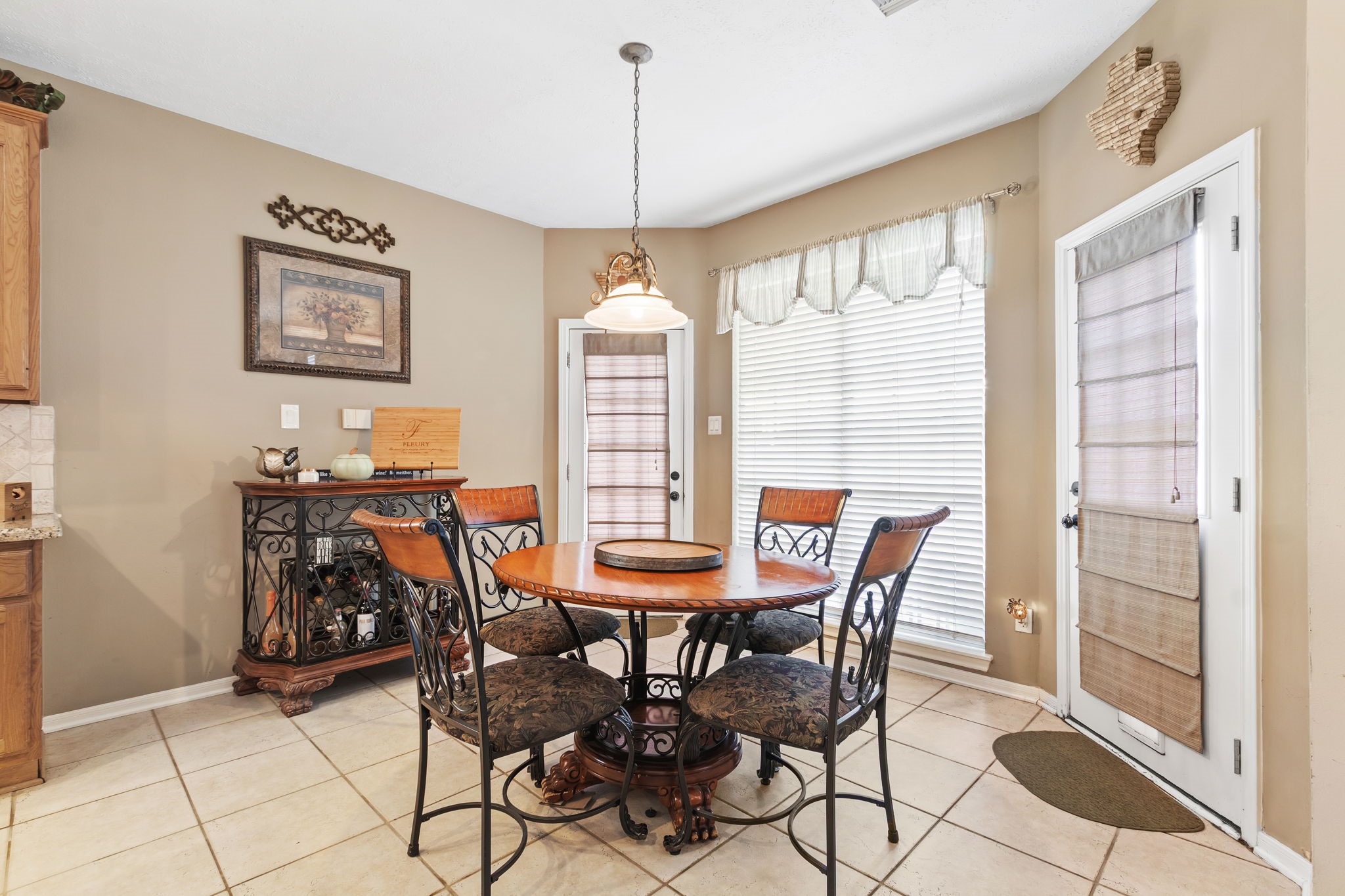 3618 Walnut Forest Lane Spring, TX 77388 - Photo 17 of 41 a view of a dining room with furniture and a chandelier