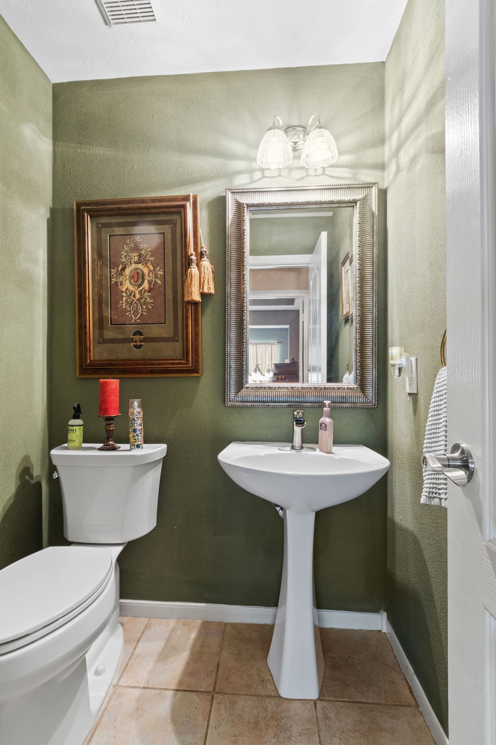 3618 Walnut Forest Lane Spring, TX 77388 - Photo 20 of 41 a bathroom with a toilet sink and mirror