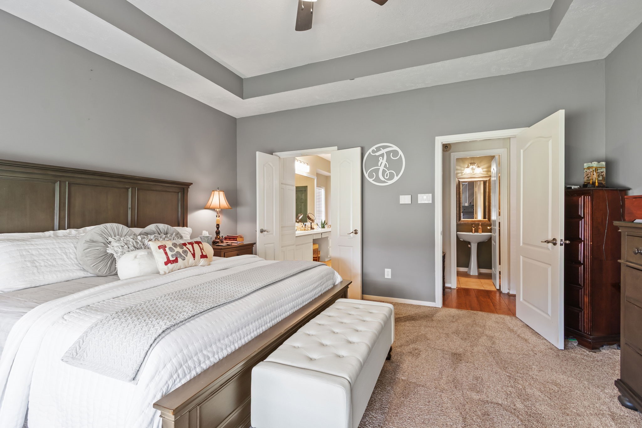 3618 Walnut Forest Lane Spring, TX 77388 - Photo 22 of 41 a bedroom with a bed and a chandelier