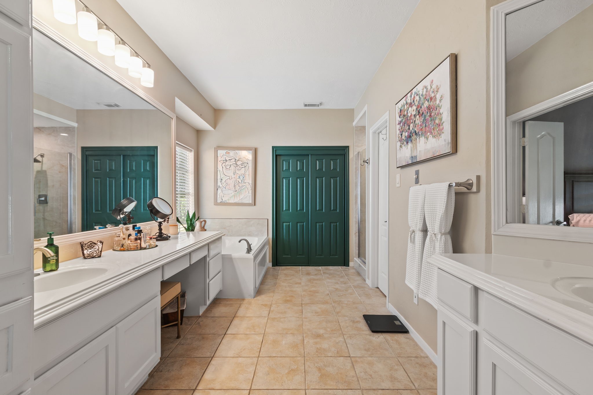 3618 Walnut Forest Lane Spring, TX 77388 - Photo 23 of 41 a bathroom with a sink a mirror and a shower