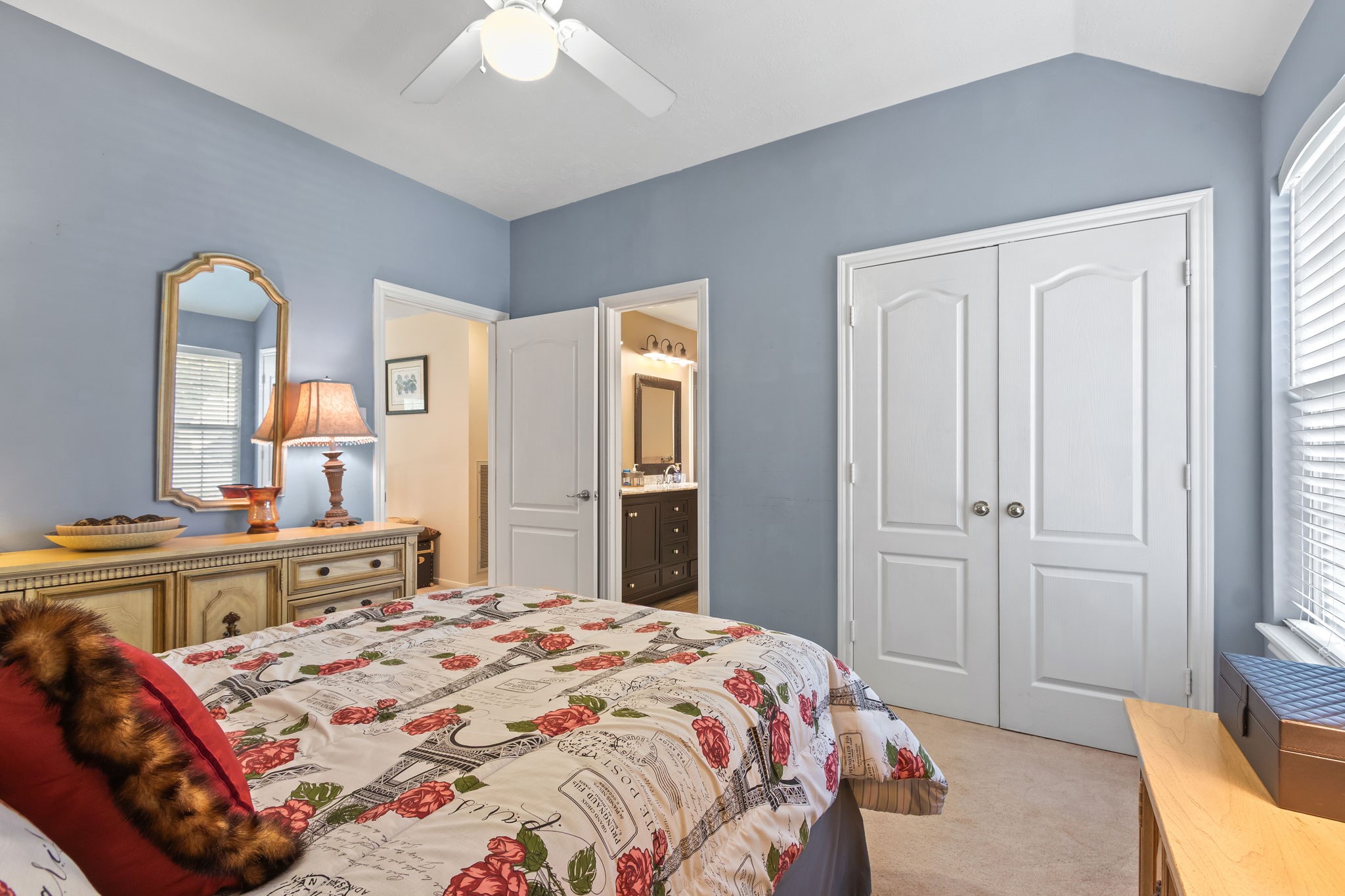 3618 Walnut Forest Lane Spring, TX 77388 - Photo 31 of 41 a bedroom with a bed and a large mirror with a dresser