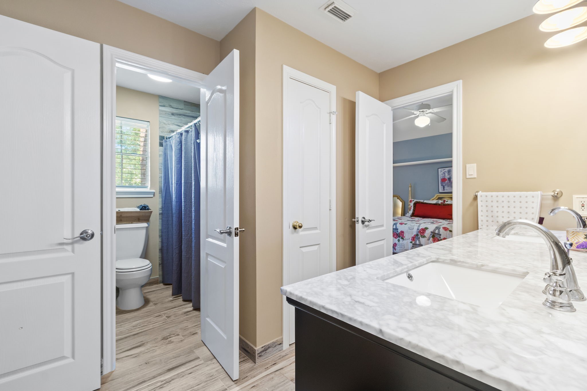 3618 Walnut Forest Lane Spring, TX 77388 - Photo 33 of 41 a en suite bathroom with a granite countertop sink and a mirror