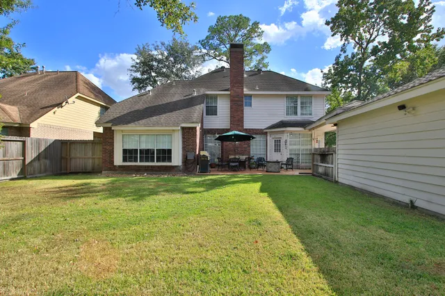 a front view of a house with a garden and porch