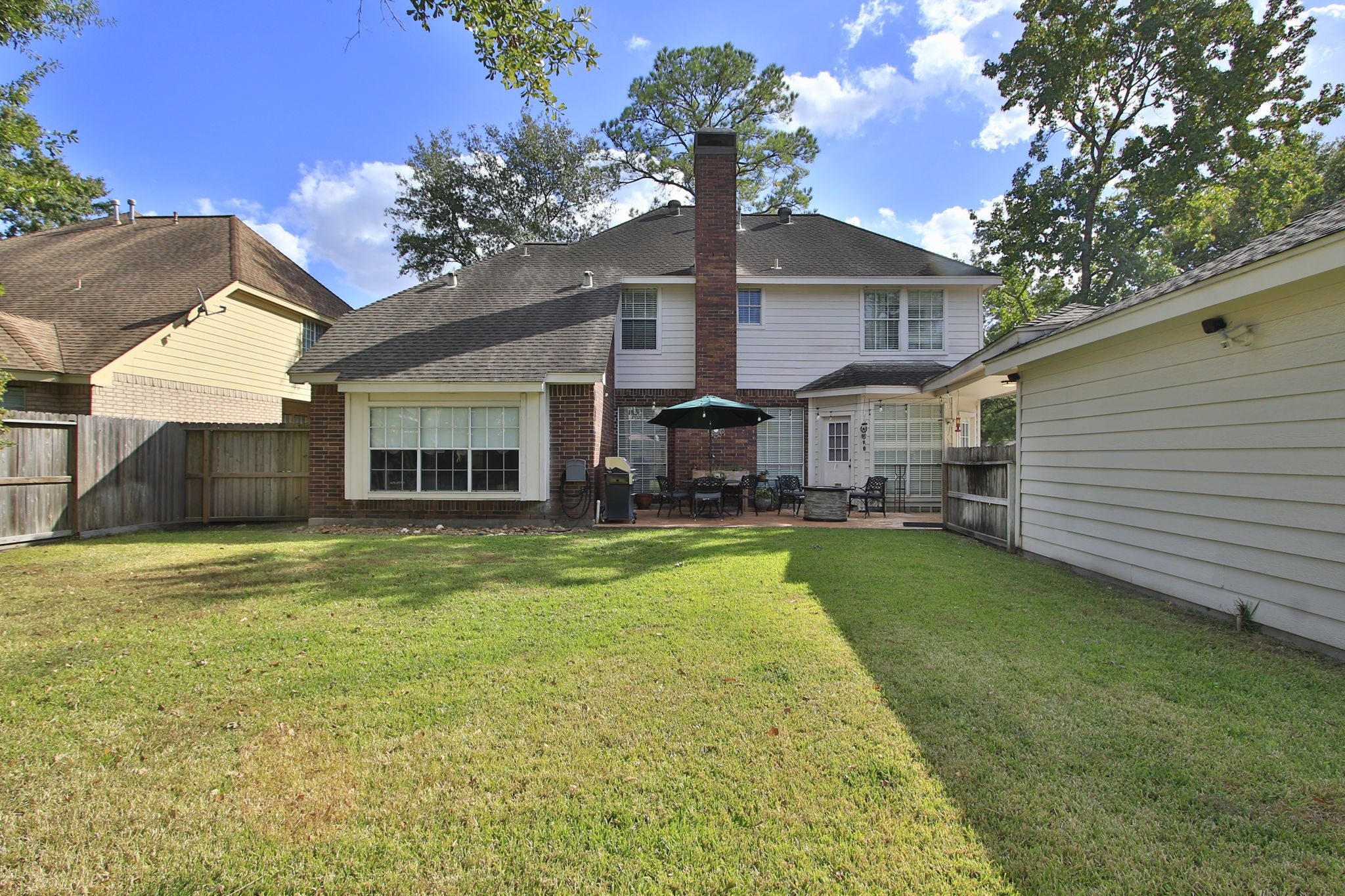 3618 Walnut Forest Lane Spring, TX 77388 - Photo 41 of 43 a front view of a house with a garden and porch