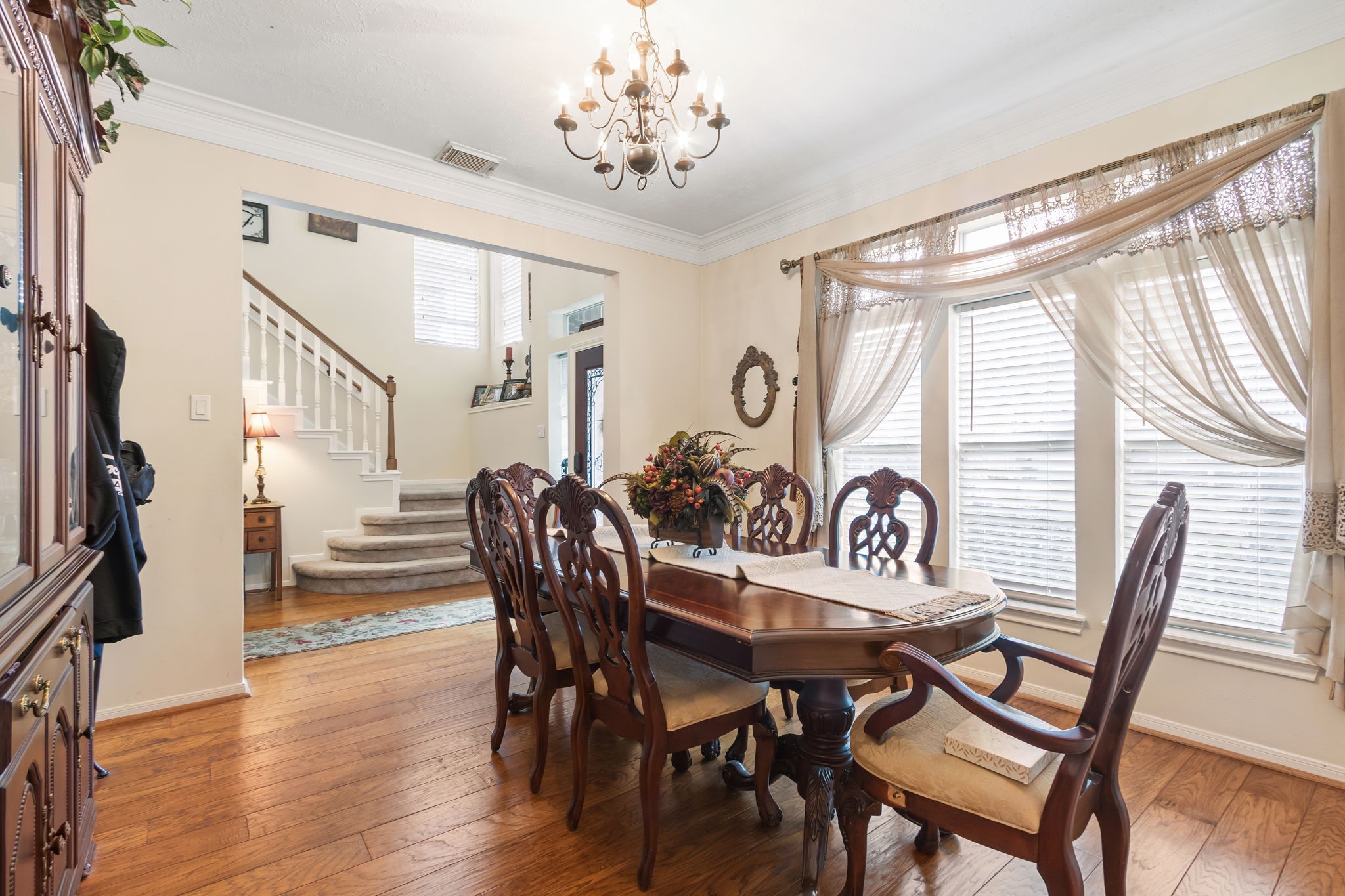 3618 Walnut Forest Lane Spring, TX 77388 - Photo 10 of 41 a view of a a dining room with furniture window and wooden floor