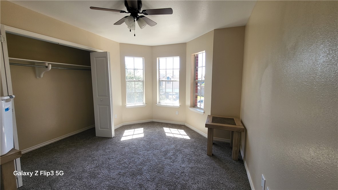 5018 Queen's Court Corpus Christi, TX 78413 - Photo 25 of 26 a view of livingroom with hardwood floor and a ceiling fan