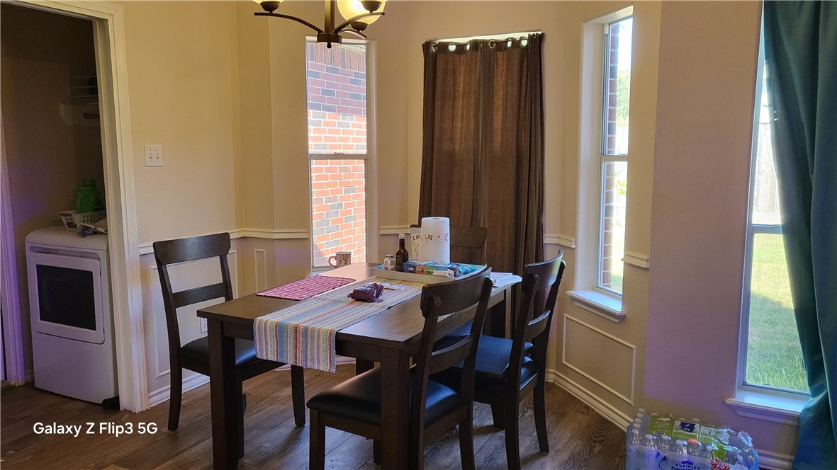 5018 Queen's Court Corpus Christi, TX 78413 - Photo 8 of 26 a view of a dining room with furniture and window