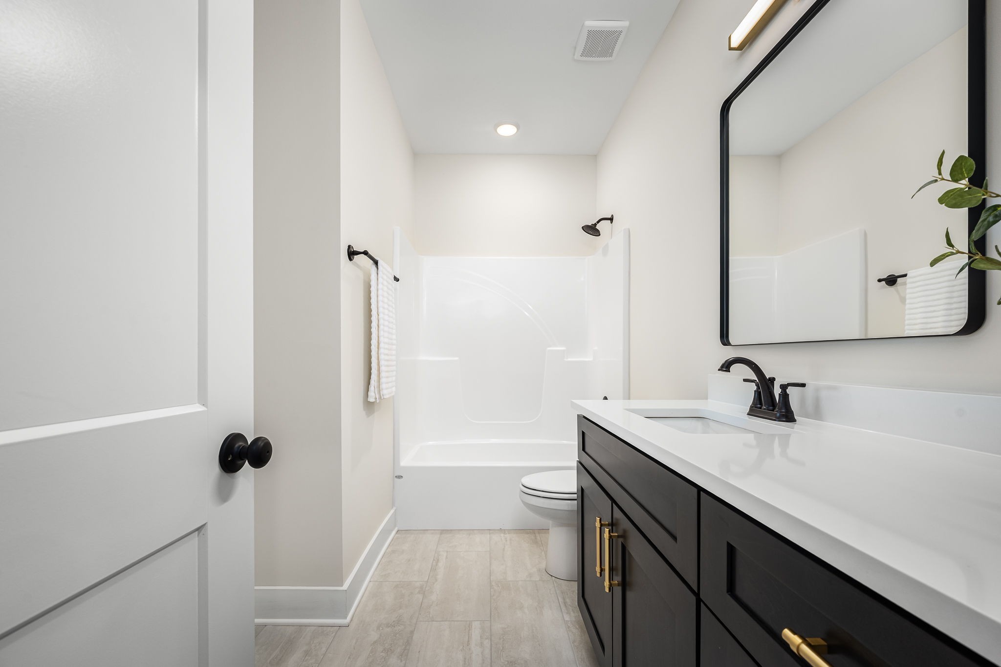 7302 West Gum Road Murfreesboro, TN 37127 - Photo 12 of 53 a bathroom with a sink a toilet and a mirror