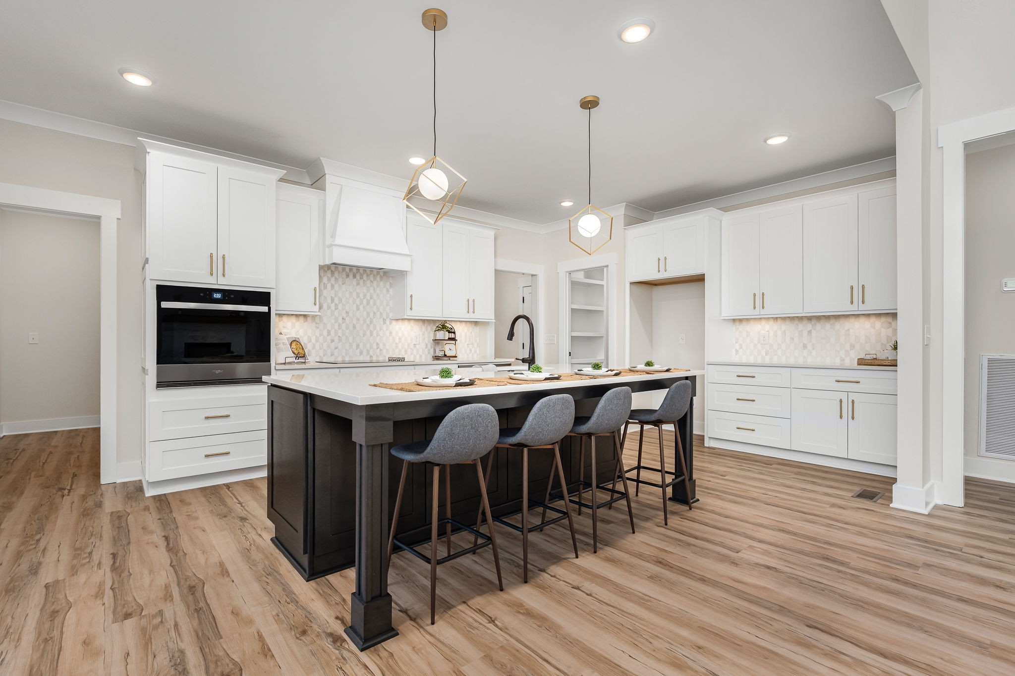 7302 West Gum Road Murfreesboro, TN 37127 - Photo 20 of 53 a kitchen with kitchen island granite countertop a sink a counter space stainless steel appliances and cabinets