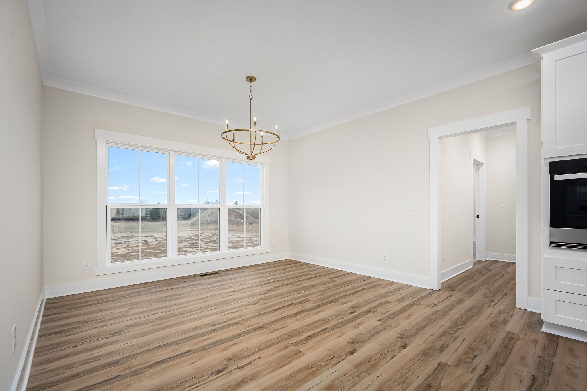 7302 West Gum Road Murfreesboro, TN 37127 - Photo 26 of 53 a view of wooden floor in a room with a window