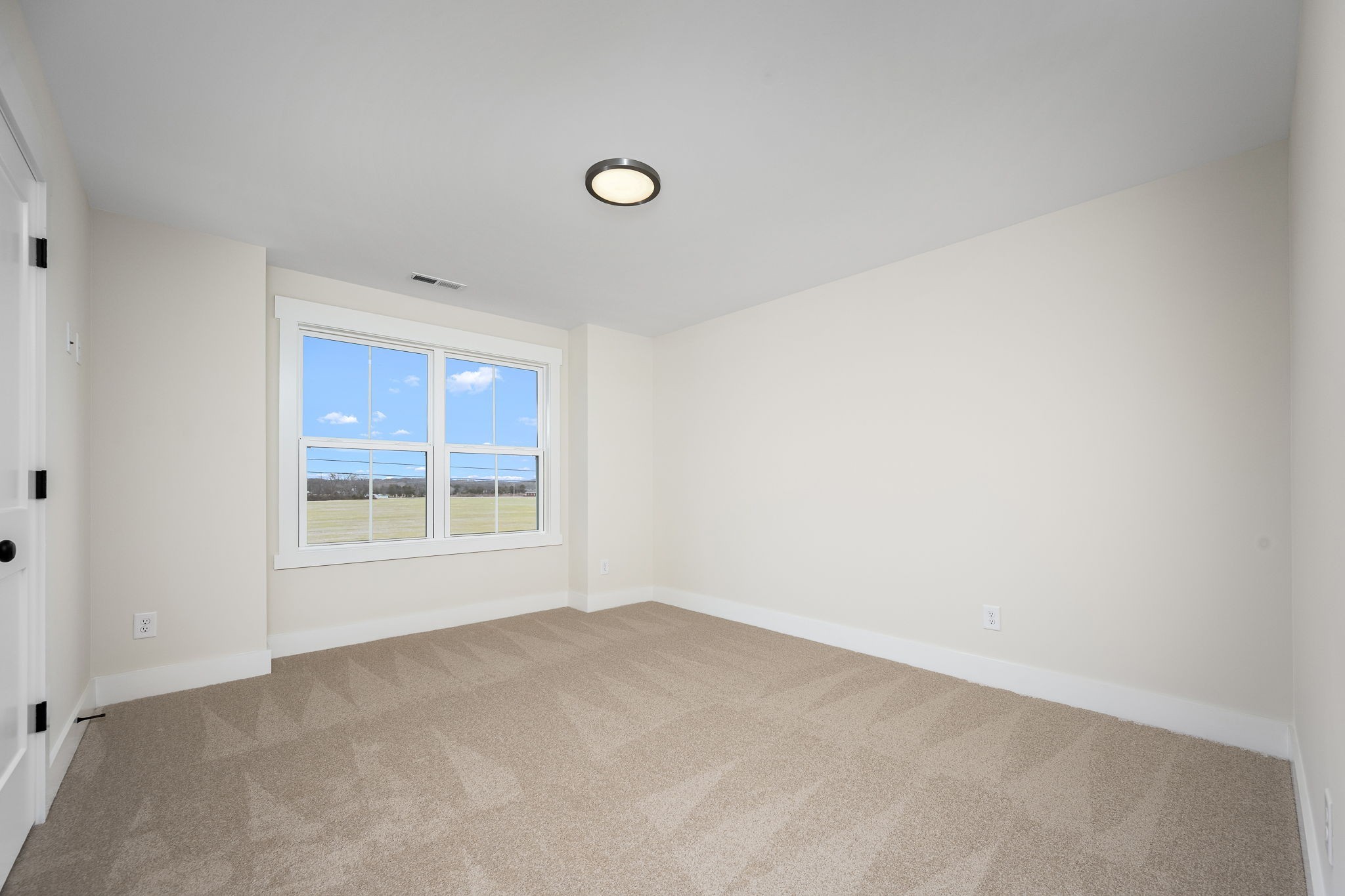 7302 West Gum Road Murfreesboro, TN 37127 - Photo 40 of 53 an empty room with a window