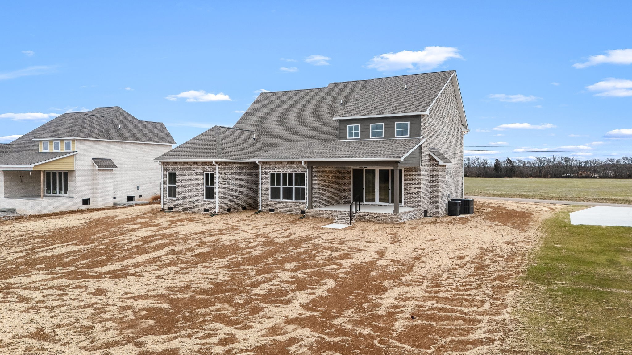 7302 West Gum Road Murfreesboro, TN 37127 - Photo 46 of 53 a front view of a house with a yard