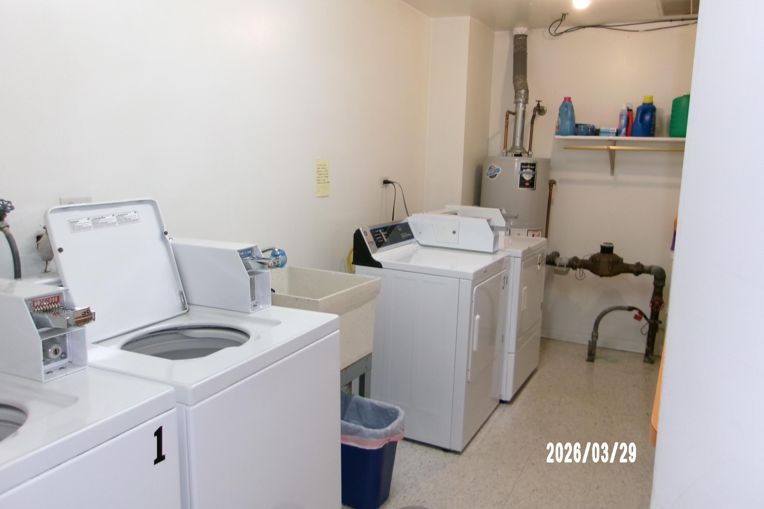 405 Old Stone Road, Unit E2 Munster, IN 46321 - Photo 20 of 20 a bathroom with a sink and a washer dryer