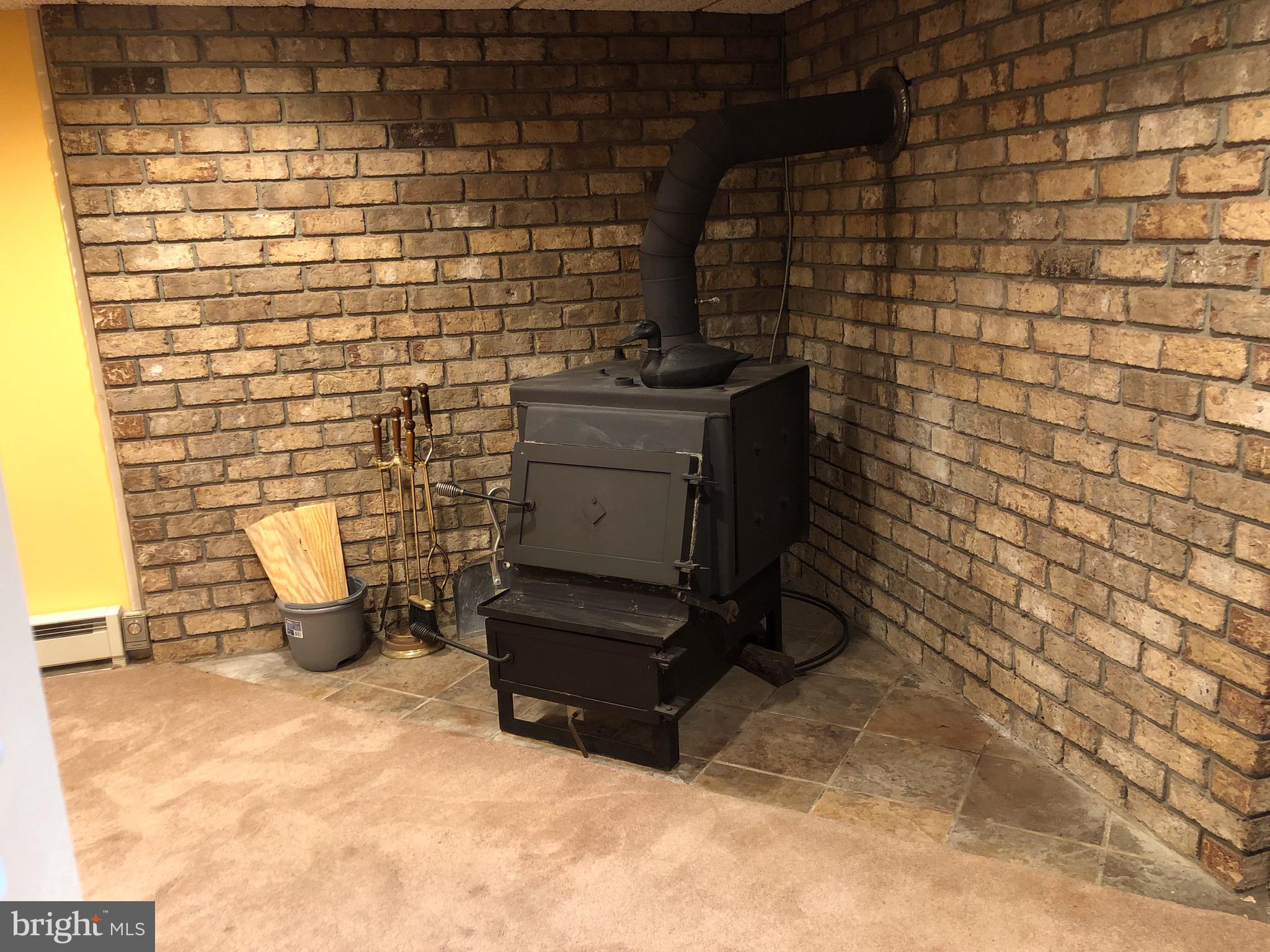 81 Jones Station Road Arnold, MD 21012 - Photo 8 of 21 LL wood stove adds to the ambiance