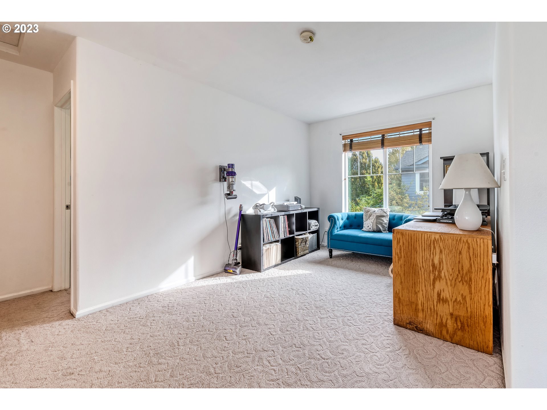 5588 Wales Drive Eugene, OR 97402 - Photo 22 of 41 a living room with furniture and a large window