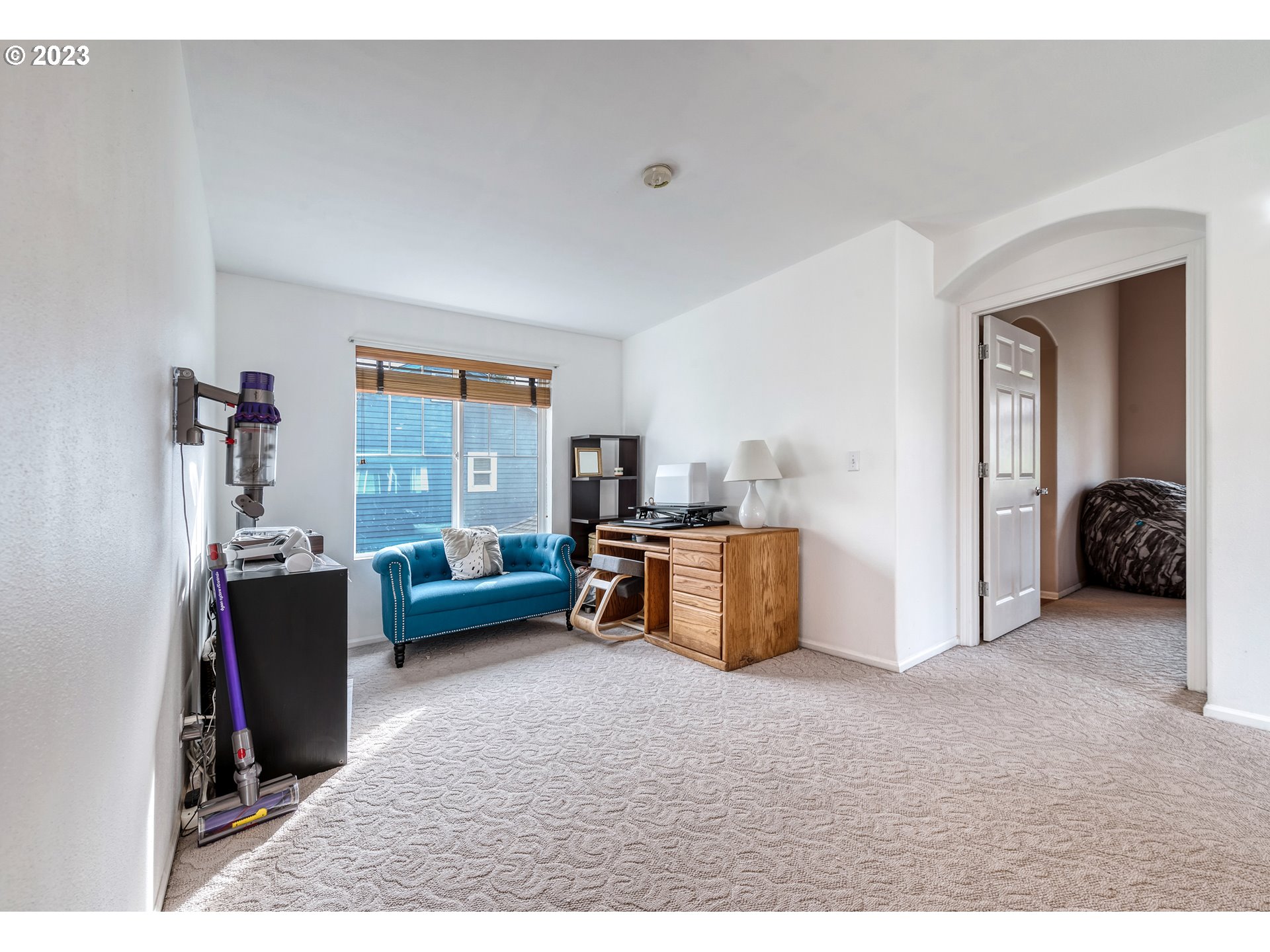 5588 Wales Drive Eugene, OR 97402 - Photo 23 of 41 a living room with furniture and a window