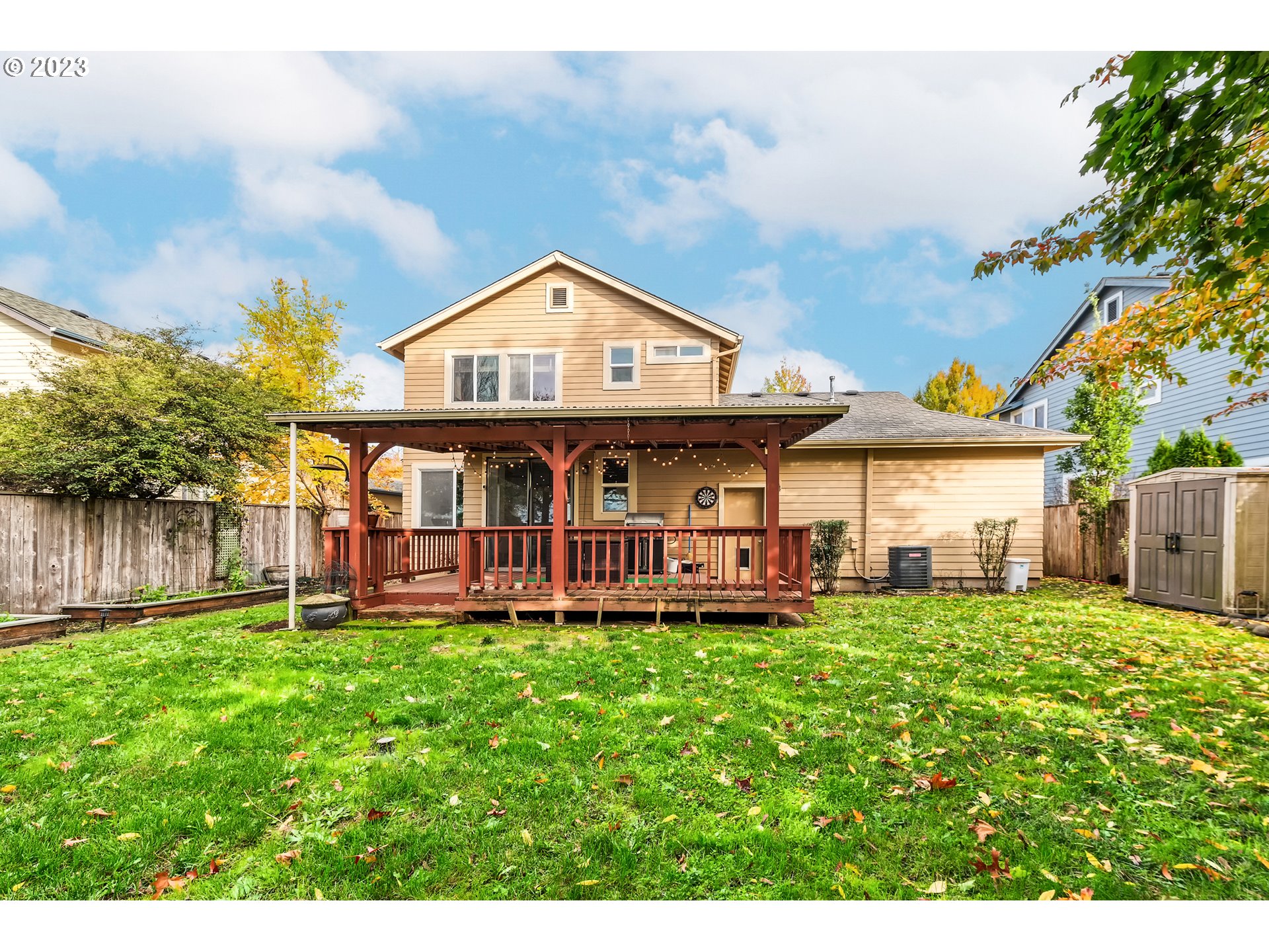 5588 Wales Drive Eugene, OR 97402 - Photo 35 of 41 a view of a house with a yard and sitting area