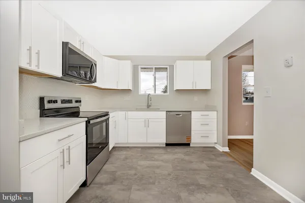 a view of a room with a bathroom