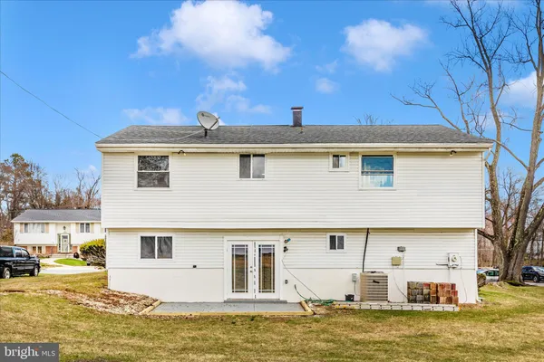 a view of swimming pool with an outdoor seating