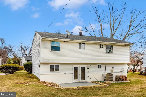 a front view of a house with yard
