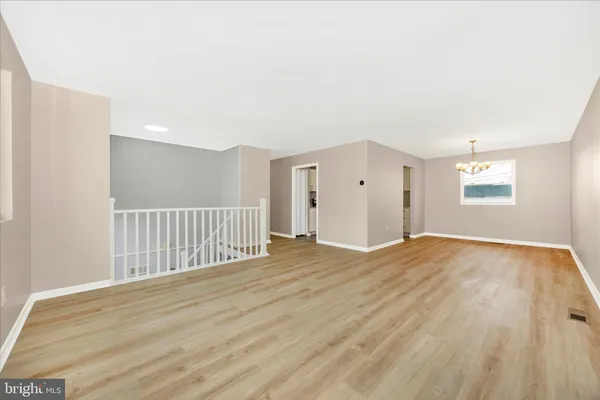 a workspace with wooden floor