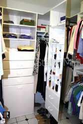 700 Starkey Road, Unit 223 Largo, FL 33771 - Photo 5 of 9 a view of walk in closet with clothes and shoes