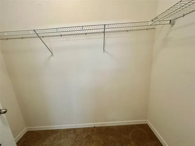 a workspace with furniture and a window