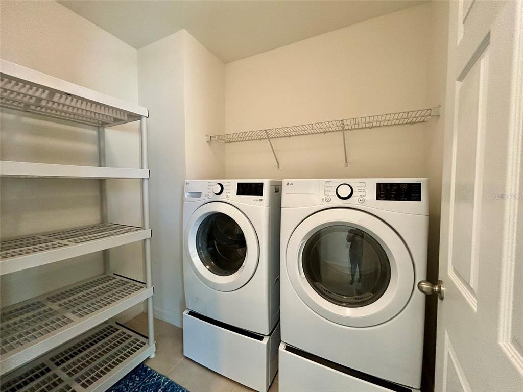 5270 Shell Mound Circle Punta Gorda, FL 33982 - Photo 18 of 23 a utility room with dryer and washer