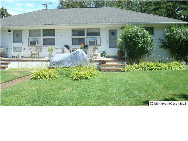 3721 River Road, Unit AD Point Pleasant, NJ 08742 - Photo 2 of 10 a black and white photo of a house