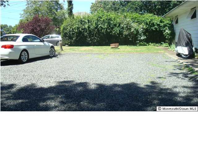 3721 River Road, Unit AD Point Pleasant, NJ 08742 - Photo 4 of 10 a view of a car park