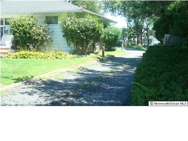 3721 River Road, Unit AD Point Pleasant, NJ 08742 - Photo 6 of 10 a black and white photo of a house