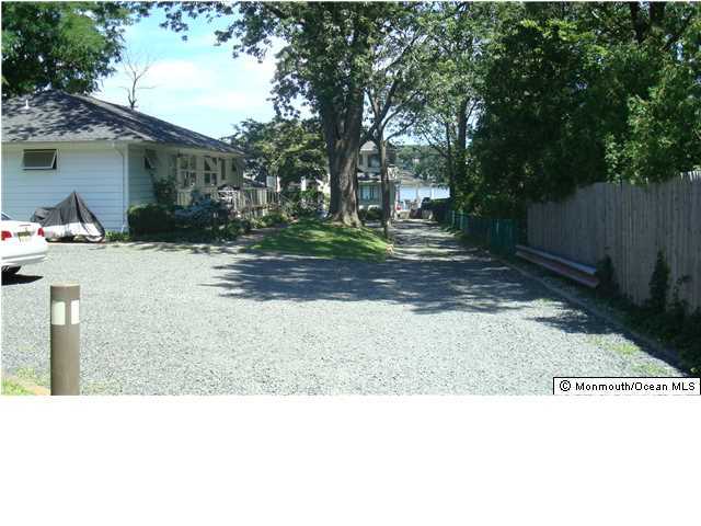 3721 River Road, Unit AD Point Pleasant, NJ 08742 - Photo 7 of 10 a black and white photo of a house