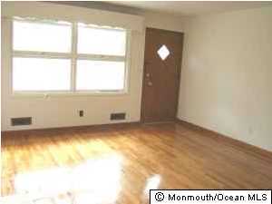 3721 River Road, Unit AD Point Pleasant, NJ 08742 - Photo 8 of 10 a view of an empty room and window