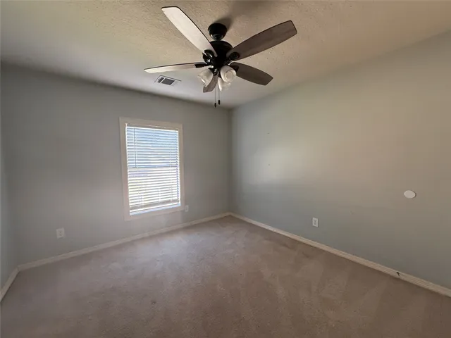 a bathroom with a double vanity sink mirror and shower