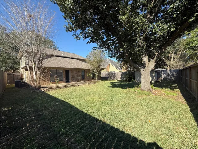 a view of swimming pool with a bench