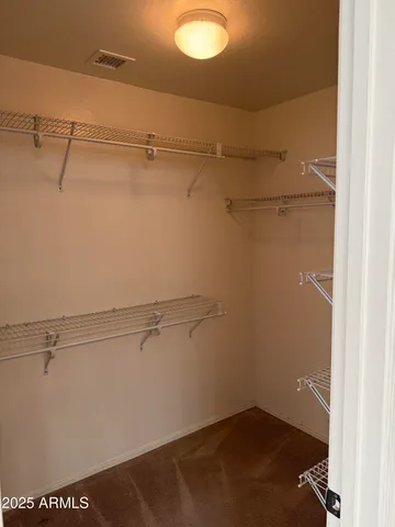 a view of a room with racks on the wall