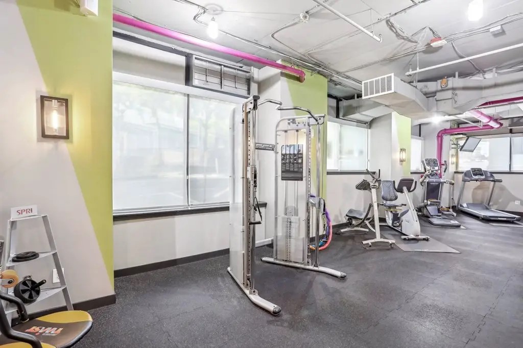 201 Yesler Way Seattle, WA 98104 - Photo 14 of 21 a view of a room with gym equipment