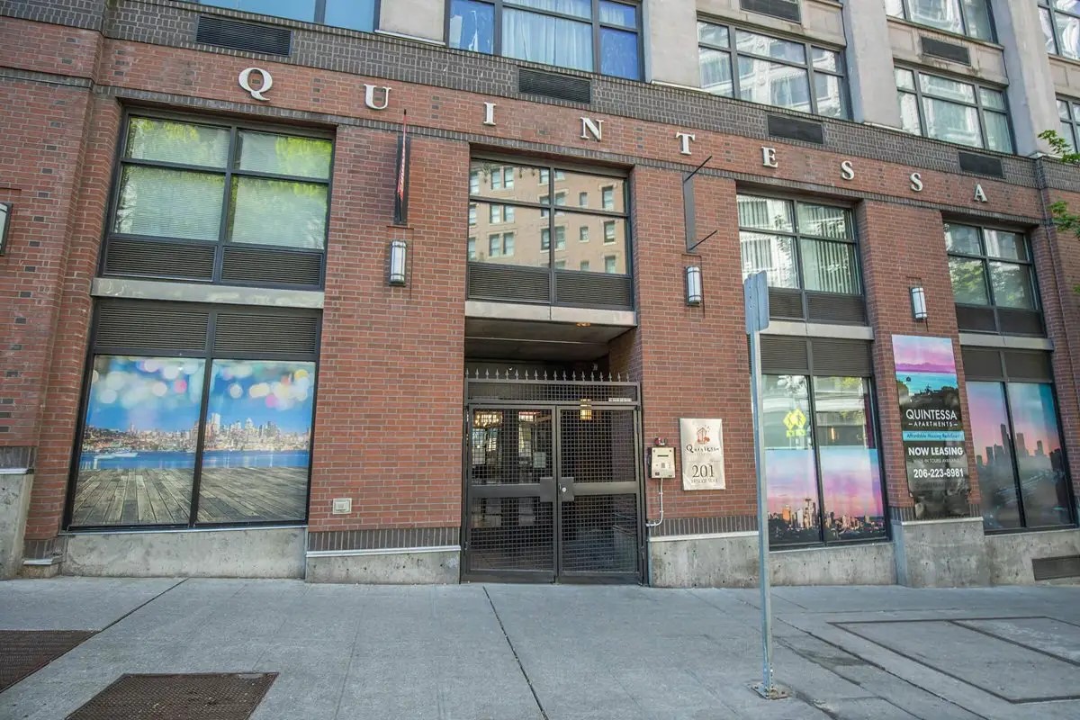 201 Yesler Way Seattle, WA 98104 - Photo 2 of 21 front view of a brick building