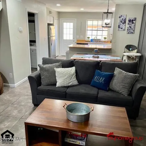 a living room with furniture and a couch