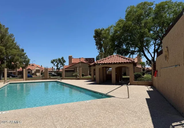 a view of a house with a swimming pool