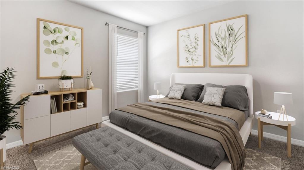 124 Nelson Road South Cape Coral, FL 33991 - Photo 6 of 10 a bedroom with a large bed and a couch