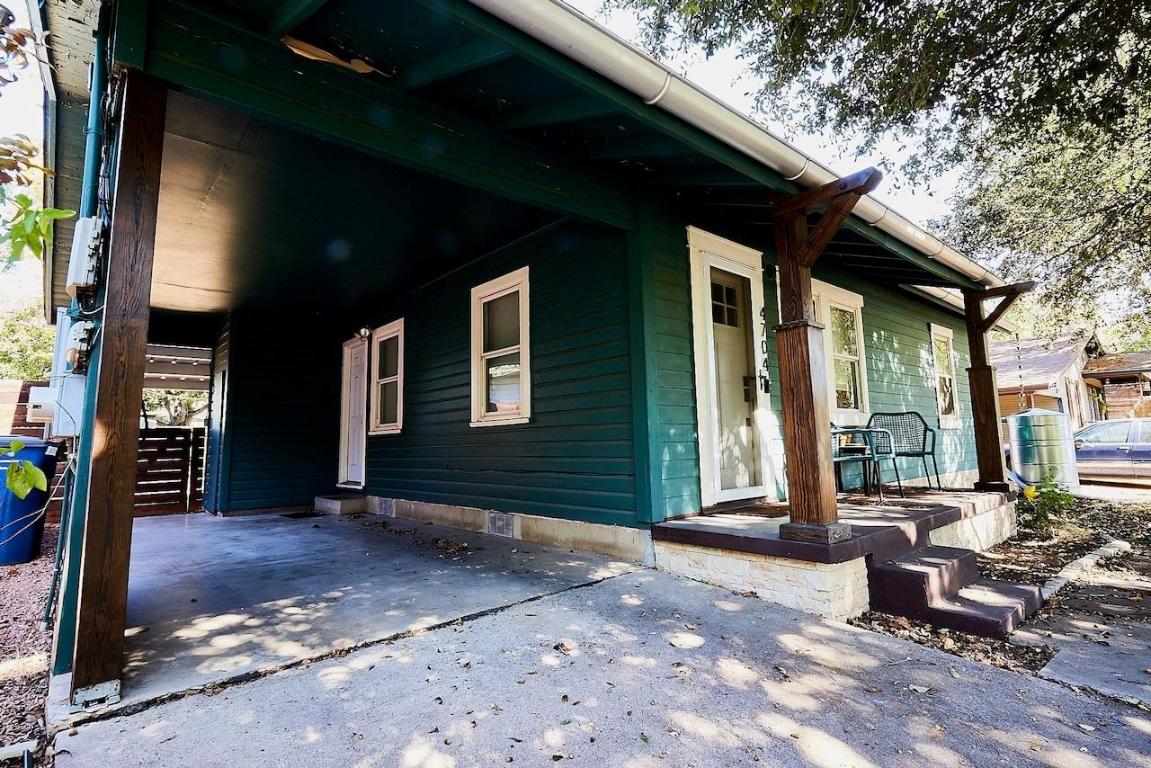 4704 Bandera Road Austin, TX 78721 - Photo 17 of 18 a view of a house with backyard porch and sitting area