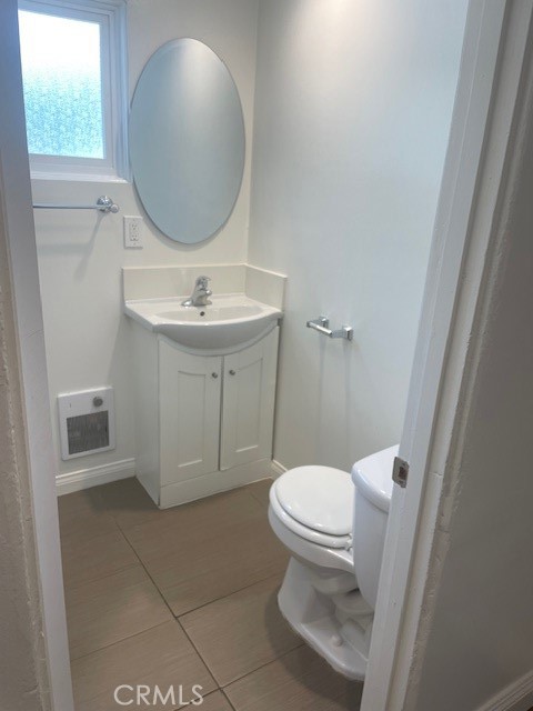 2023 Lovila Lane Altadena, CA 91001 - Photo 8 of 14 a bathroom with a sink a toilet and a mirror