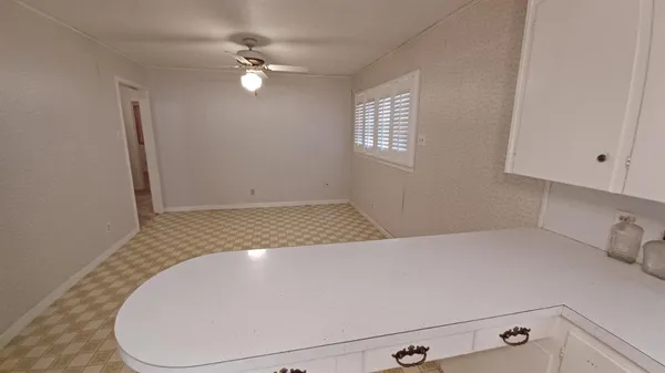 a bathroom with a sink a mirror and a bathtub