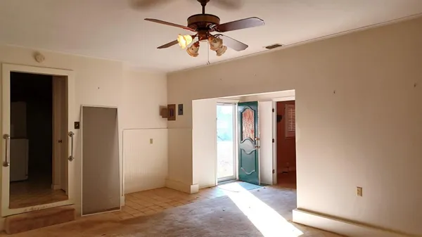 an empty room with a door
