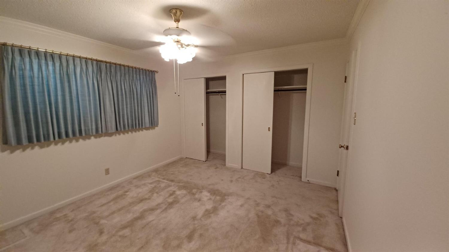 206 South W 7th Street Lockney, TX 79241 - Photo 31 of 47 a view of an empty room with a window